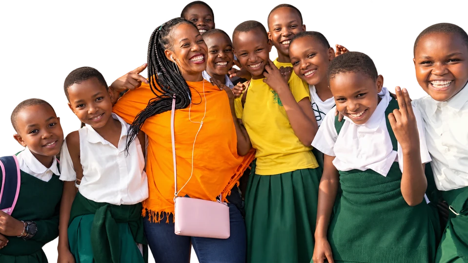 Candice Bunch-Kivuyo smiling with students